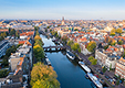 Regeneron location in Amsterdam, Netherlands. Amsterdam skyline with a canal.